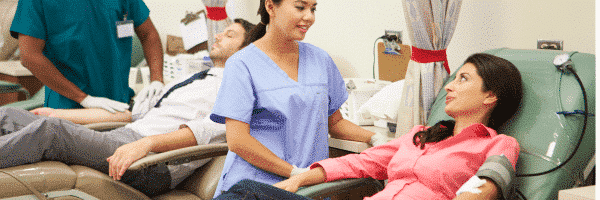 Woman giving blood